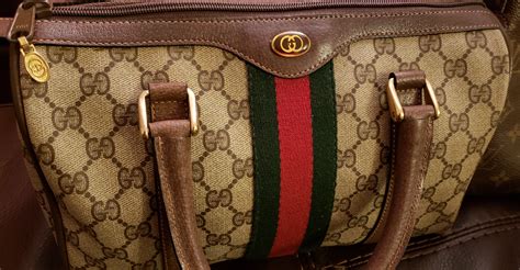 how to tell if your gucci gasses are real|identify vintage gucci bags.